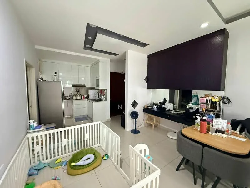 Living features: white painted walls, grey accent wall, tile flooring, recessed ceiling with lighting, ceiling fan, dining table with grey upholstered chairs, kitchen area with white cabinetry, stainless-steel fridge, open layout, playpen, green pet bed, decorative items on countertop; style: modern.