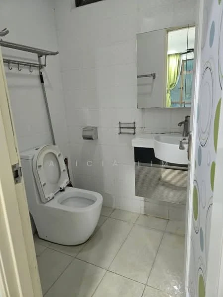 Bathroom features: white tiled walls, light grey floor tiles, one-piece toilet, wall-mounted sink, mirror above sink, chrome faucet, towel rack, shower curtain rod, green curtains, decorative wall with circular patterns; style: modern.