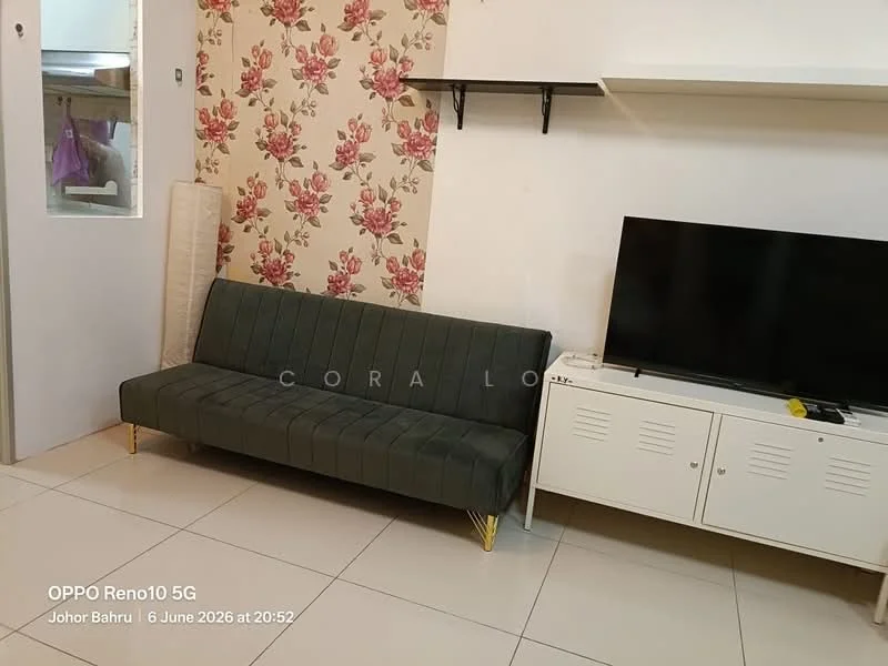 Living features: green fabric sofa with gold legs, white TV console, wall-mounted TV, floral wallpaper, white painted walls, tile flooring, shelf above the sofa, window with sheer curtains; style: modern.