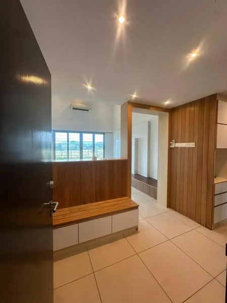 Room features: white tiled flooring, wood panel accent wall, built-in bench with wooden top, wall-mounted air conditioning unit, recessed ceiling lights, large windows with city view, open layout, neutral wall color; style: modern; view: city.