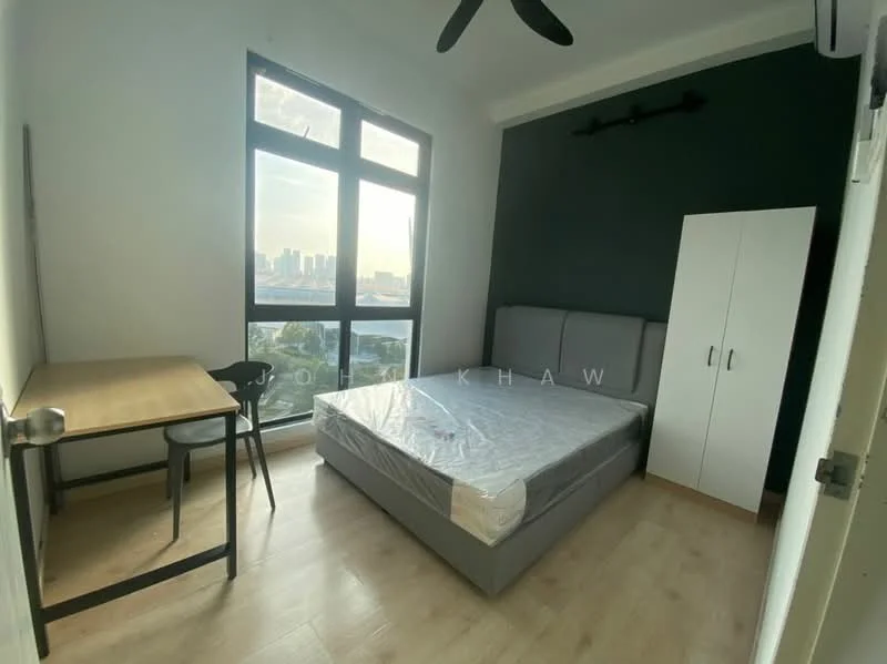 Bedroom features: queen-size bed with grey upholstered headboard, white bedding, black ceiling fan, large floor-to-ceiling windows, green accent wall, light wood flooring, study desk with black chair, white wardrobe; style: modern; view: city.