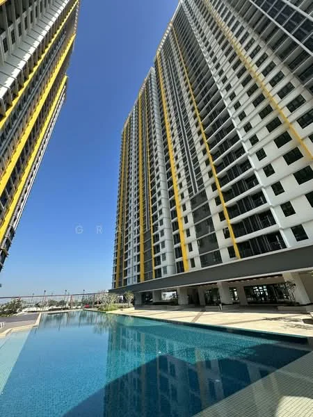 Exterior type: high-rise condominium; features: two high-rise buildings, yellow accent panels on facade, glass curtain wall, infinity pool, pool deck, landscaped area, clear blue sky, surrounding urban context; style: modern.