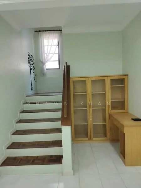 Room features: staircase with wooden handrail, white painted walls, light green accent wall, large window with sheer curtains, wooden cabinet with glass doors, wooden desk, parquet wood flooring, white tiled flooring; style: modern.
