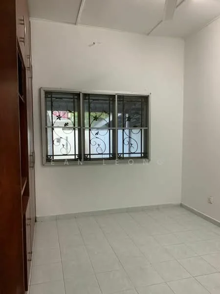 Room features: white painted walls, tile flooring, three metal-framed windows with decorative grills, no visible furniture, plain ceiling, light switch on the wall, corner of built-in cabinetry, neutral color scheme; style: modern.