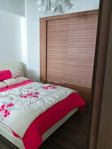 Bedroom features: queen-size bed with floral bedding, wooden wardrobe with sliding doors, laminate flooring, white walls, chandelier light fixture, decorative pillows, bedside table, window with natural light; style: modern.