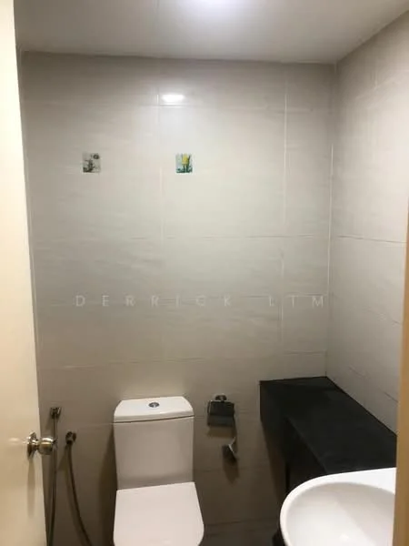 Bathroom features: white toilet, black countertop, grey tiled walls, grey tiled flooring, handheld bidet spray, toilet paper holder, wall-mounted mirror, wall-mounted faucet; style: modern.