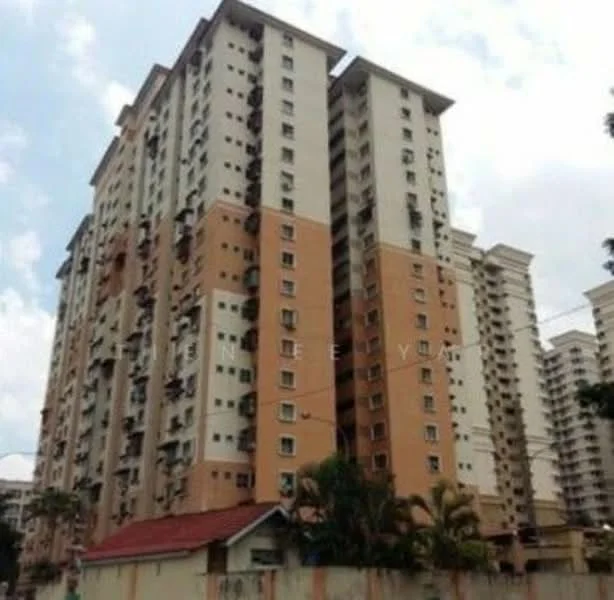 Exterior type: high-rise condominium; features: multi-storey building, cream painted facade, orange accent panels, balconies on multiple floors, visible air conditioning units, surrounded by greenery, urban context, nearby low-rise structures; style: modern.