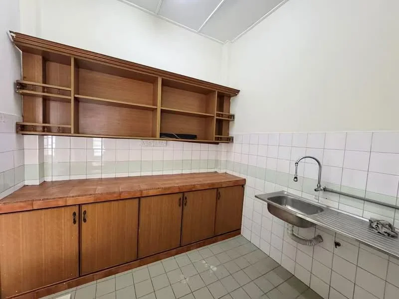Kitchen features: wood cabinetry with open shelving, laminate countertop, stainless-steel sink, chrome faucet, white tiled walls, grey tiled flooring, built-in cabinets, under-cabinet lighting.