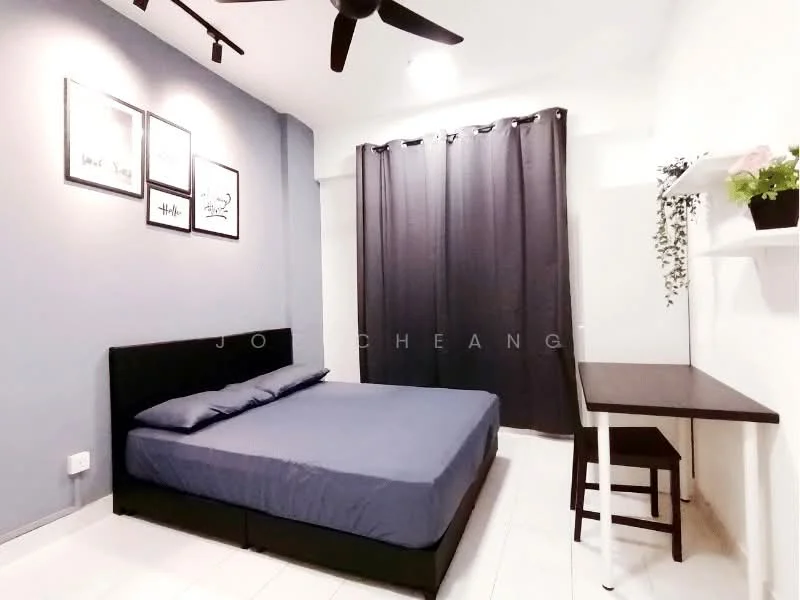 Bedroom features: king-size bed with blue bedding, black upholstered bed frame, grey painted walls, white ceiling, 5-blade ceiling fan, black curtains, white shelf with decorative plant, study desk with black legs and wooden top, white tiled flooring, framed artwork on walls; style: modern.