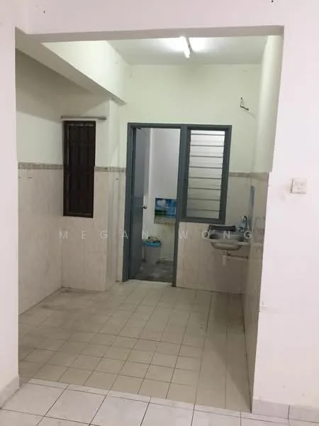Room features: white painted walls, cream tiled flooring, single sink with chrome faucet, wall-mounted mirror, window with metal grille, light fixture on ceiling, tiled backsplash, doorway leading to another room.