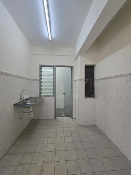 Room features: white painted walls, grey tiled flooring, single-bowl stainless-steel sink, chrome faucet, wall-mounted cabinet, window with louvered glass, door leading to another room, tile backsplash, fluorescent ceiling light.
