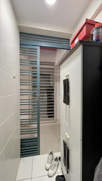Room features: white tiled walls, grey tiled flooring, sliding glass door, metal grille door, shoe cabinet, storage cabinet, overhead lighting, open space leading to outdoor area; style: modern.