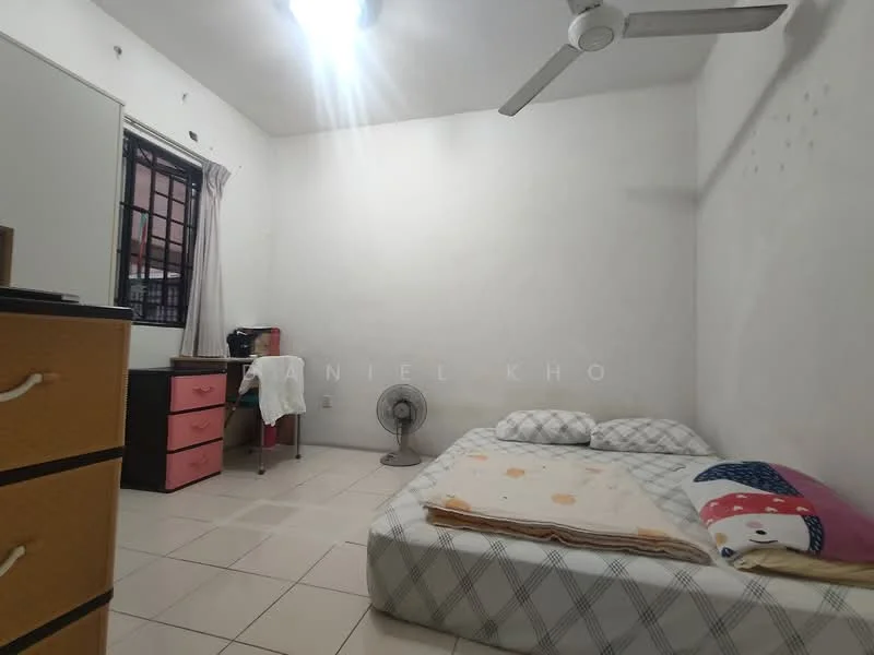 Bedroom features: white painted walls, tile flooring, ceiling fan, double bed with bedding, wooden dresser with drawers, pink storage unit, window with black grille, floor fan.