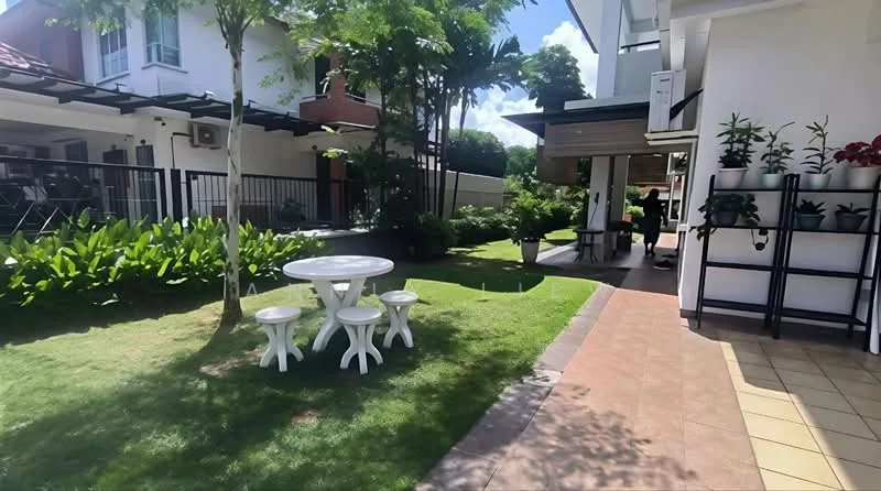 Exterior type: detached bungalow; features: manicured lawn, mature trees, outdoor dining table with chairs, paved walkway, landscaped garden, covered patio area, fenced perimeter, lush greenery; style: modern.