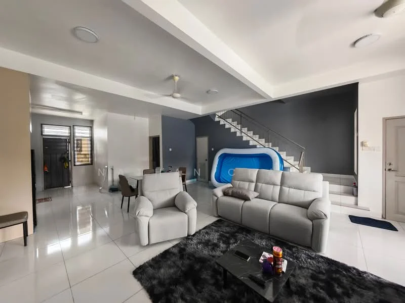 Living features: grey leather sectional sofa, recliner chair, black coffee table, area rug with geometric pattern, ceiling fan with light, white painted walls, white tiled flooring, large windows, staircase in background, blue inflatable pool in background; style: modern. Hallway features: white painted walls, white tiled flooring, doorway leading to entrance, staircase leading to upper floor; style: modern.