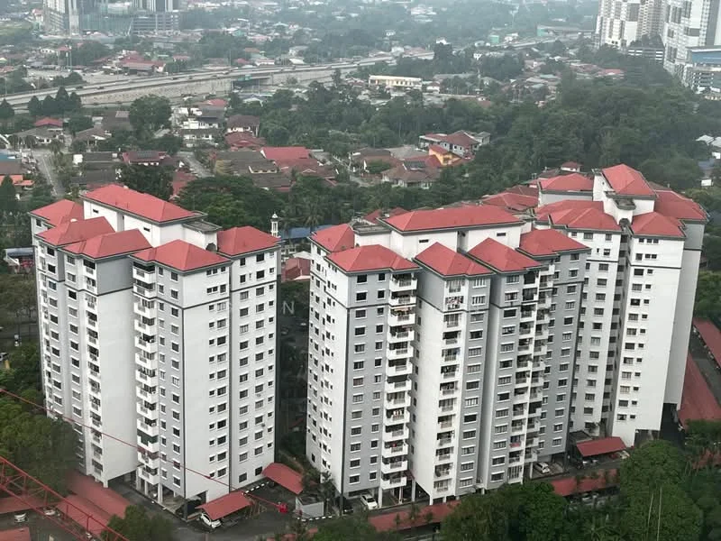 Exterior type: mid-rise condominium; features: white painted facade, red pitched tile roof, multiple balconies, surrounded by greenery, parking area visible, urban context with nearby buildings, approximately 5-storey high-rise; style: modern.