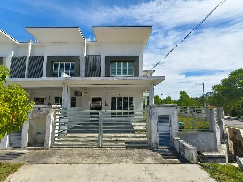 Exterior type: linked terrace house; features: white painted facade, flat roof, two-storey structure, concrete driveway, metal gate, front porch, landscaped garden area, visible utility meters, surrounded by greenery, street view, sidewalk; style: modern.