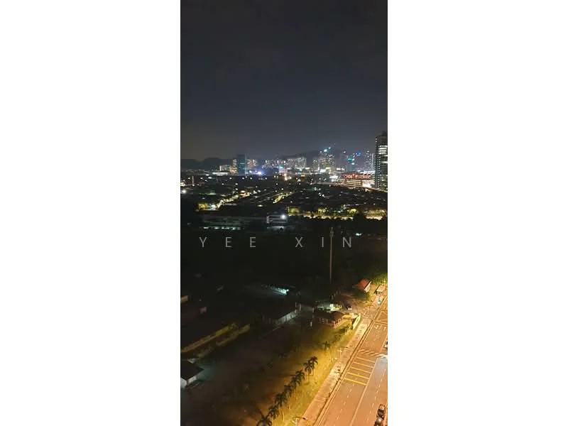 Exterior type: high-rise condominium; features: city skyline view, night lighting, surrounded by urban landscape, visible road, palm trees in foreground; style: modern.