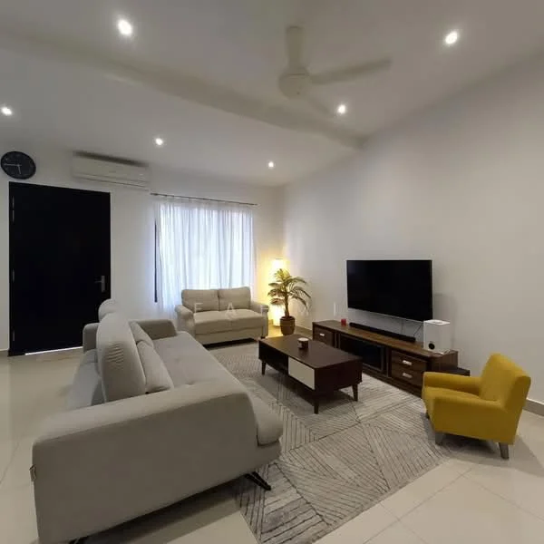 Living features: 3-seater fabric sofa in light grey, 2-seater fabric sofa in light grey, yellow accent chair, wood coffee table, TV console with storage, wall-mounted flat-screen TV, area rug with geometric pattern, floor-to-ceiling window with sheer curtains, ceiling fan, recessed downlights, wall clock, potted plant; style: modern.