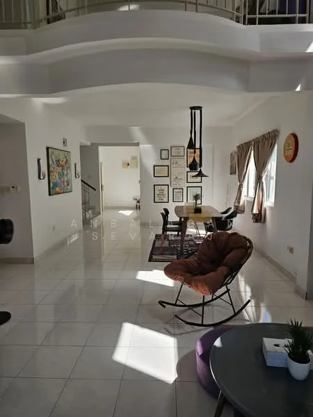 Living features: white painted walls, glossy tile flooring, recessed downlights, large windows with sheer curtains, decorative wall art, area rug with geometric pattern, hanging pendant light, rocking chair, round coffee table, sofa, wall-mounted artwork, framed pictures, open layout; style: modern.