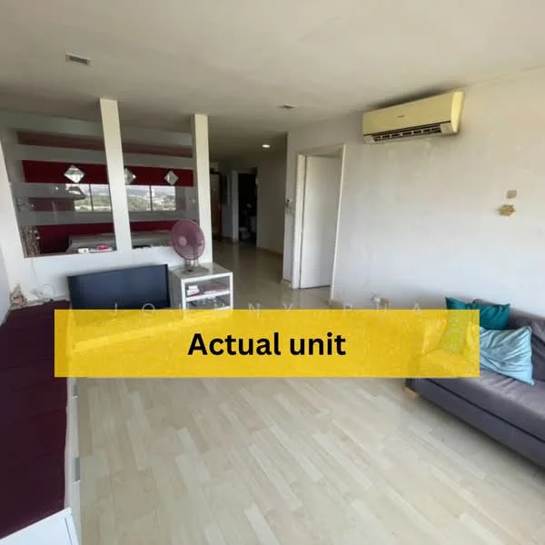 Living features: laminate flooring, white painted walls, ceiling-mounted air conditioning unit, sofa with cushions, decorative throw pillows, wall-mounted mirror, open layout to adjacent room, large window for natural light; style: modern.
