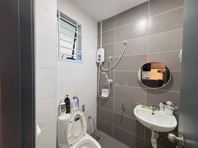 Bathroom features: white tiled walls, grey tiled walls, shower with handheld showerhead, wall-mounted water heater, round mirror, white pedestal sink, toilet, window with security bars, grey floor tiles; style: modern.