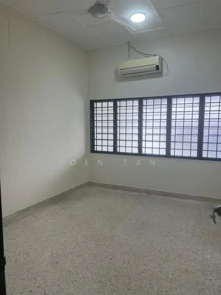 Room features: white painted walls, grey speckled flooring, 1 wall-mounted split AC, ceiling light, black grille windows.