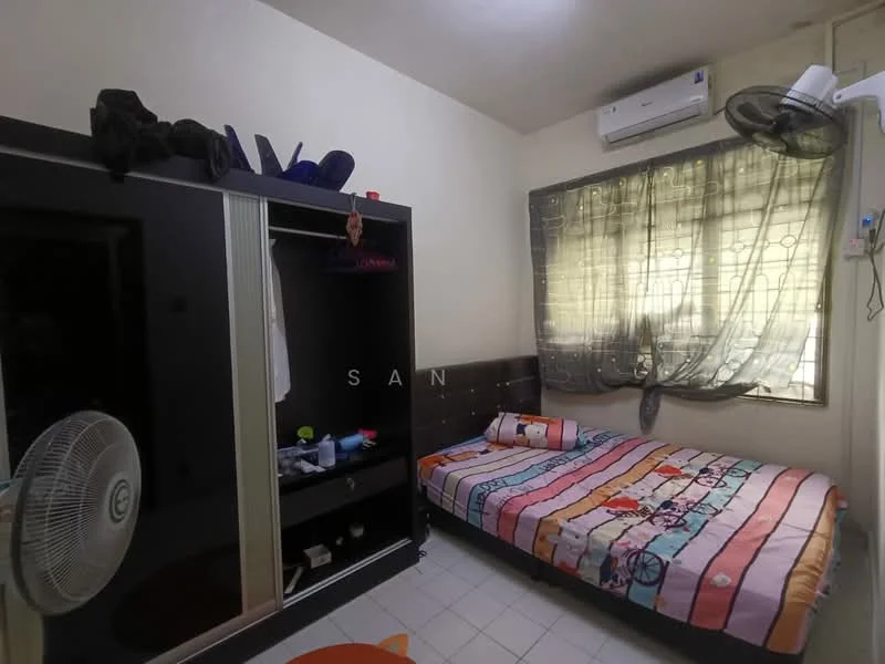 Bedroom features: single bed with colorful bedding, black wardrobe with sliding doors, wall-mounted air conditioning unit, ceiling fan, curtains with geometric pattern, white tiled flooring, decorative wall art, small bedside table, open shelving unit.