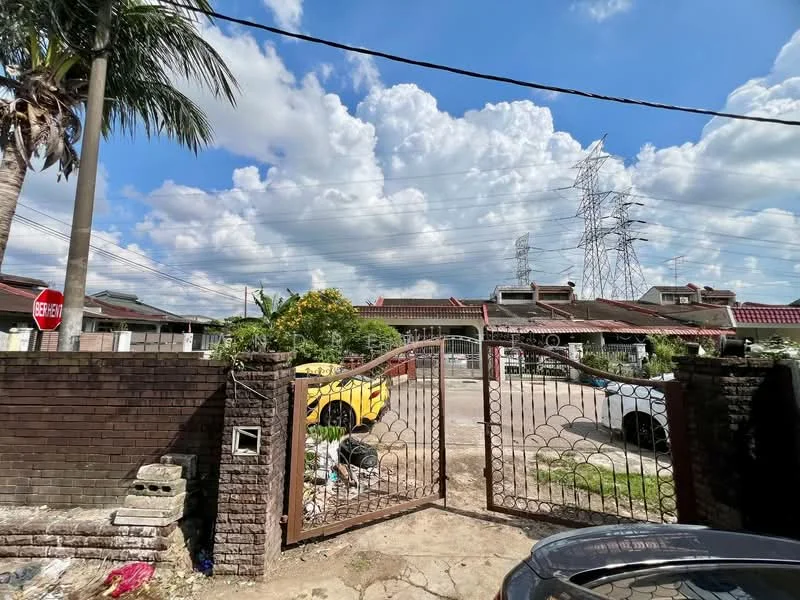 Exterior type: linked terrace house; features: brick facade, gated entrance, manicured lawn, paved driveway, surrounded by palm trees, power lines visible, multiple vehicles parked, clear blue sky with clouds; style: modern.