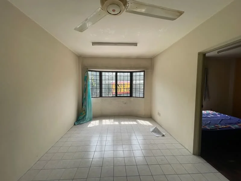 Room features: white painted walls, tile flooring, 5-blade ceiling fan, large window with grid pattern, curtain on window, natural light from window, corner of room with door leading to another room.