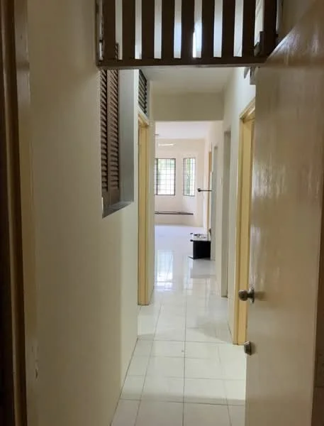 Room features: white painted walls, glossy tile flooring, wooden door frames, sliding window with wooden shutters, multiple doorways, natural light from windows, neutral color scheme, open layout; style: modern.