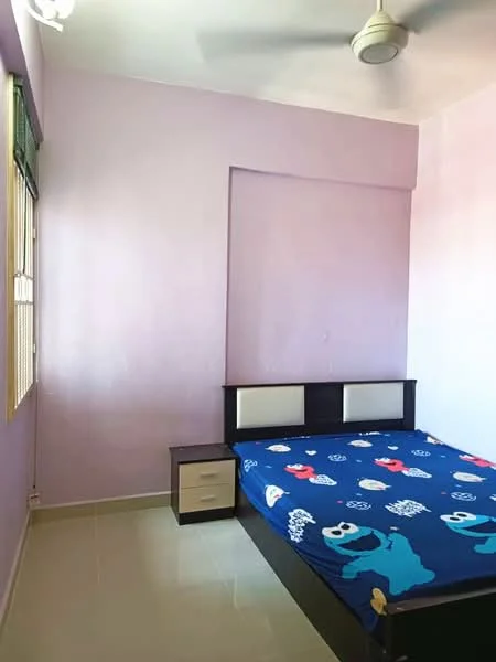 Bedroom features: purple painted walls, white ceiling, ceiling fan, single bed with blue bedding featuring cartoon characters, nightstand with drawer, tile flooring, window with blinds.