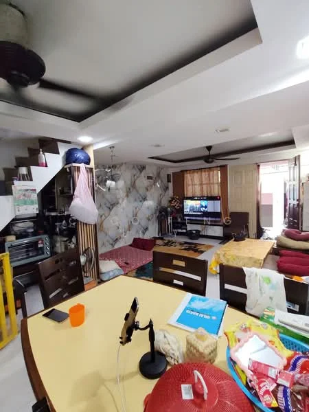 Living features: ceiling fan, wall-mounted TV, wooden dining table, 4 dining chairs, sofa with cushions, decorative wall with patterned wallpaper, carpeted floor, open layout, staircase, multiple cushions on the floor, various decorative items, television console; style: modern.