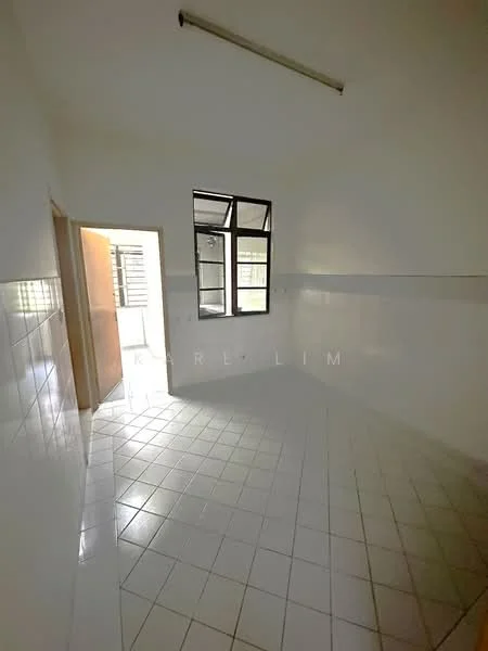 Room features: white painted walls, white tiled flooring, single window with grid design, door leading to another room, fluorescent ceiling light.