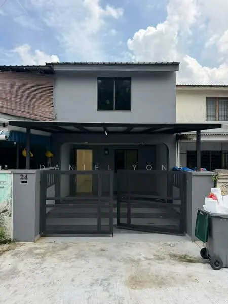 Exterior type: linked terrace house; features: grey painted facade, flat roof, single-storey, covered car porch, metal gate, concrete driveway, front porch area, large window, door with security grill; style: modern.