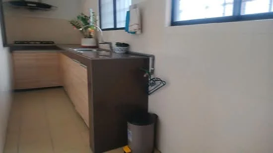 Kitchen features: single-bowl stainless-steel sink, chrome pull-down faucet, laminate countertop, wood cabinetry, built-in gas hob, exhaust hood, tile backsplash, floor tiles, window for natural light, kitchen trash bin; style: modern.