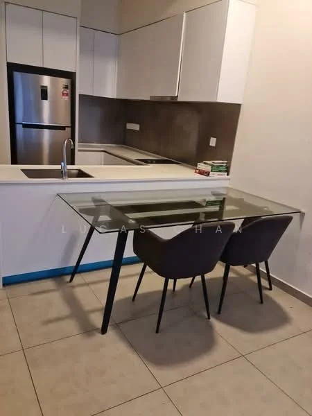 Kitchen features: white cabinetry, grey backsplash, stainless-steel fridge, single-bowl stainless-steel sink, chrome pull-down faucet, glass dining table, 2 black upholstered dining chairs, ceramic tile flooring, wall-mounted kitchen cabinets, countertop with integrated sink; style: modern.