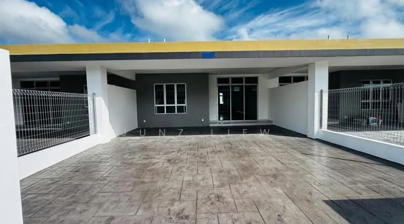 Exterior type: detached bungalow; features: grey painted facade, flat roof, manicured lawn, concrete driveway, fenced perimeter, multiple windows, covered porch area, textured concrete flooring; style: modern.