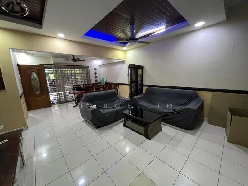 Living features: white tiled flooring, cream painted walls, wooden ceiling with recessed lighting, 5-blade ceiling fan, 2 fabric sofas in grey, glass coffee table, dining area visible in background, wooden dining table with chairs, decorative wall paneling, sliding door to outdoor area; style: modern.