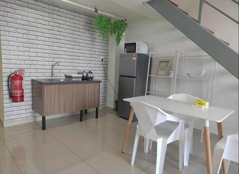 Kitchen features: grey brick accent wall, white painted walls, ceramic tile flooring, wood cabinetry with brown finish, single-bowl stainless-steel sink, chrome pull-down faucet, stainless-steel fridge, microwave, white dining table, 4 white chairs, fire extinguisher, open shelving unit; style: modern.