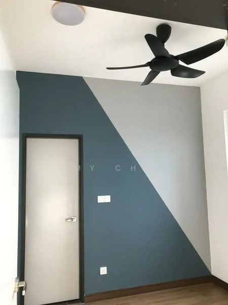 Room features: two-tone painted walls with dark blue and light grey, light brown laminate flooring, modern ceiling fan, single door, light switch, power outlet; style: modern.