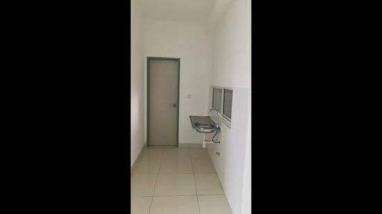 Laundry features: white painted walls, tile flooring, single window, countertop, laundry sink, door, light fixture.