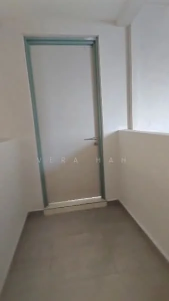 Room features: white painted walls, light grey floor tiles, single door with metal frame, natural light from window, minimalist design; style: modern.