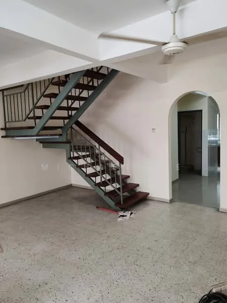 Room features: staircase with metal railing, concrete flooring, ceiling fan, white painted walls, arched doorway, open layout, natural light from windows, neutral color scheme; style: modern.