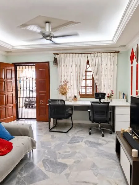 Study features: marble flooring, tray ceiling, 5-blade ceiling fan, floor-to-ceiling windows, wooden door with decorative panels, white curtains with floral pattern, built-in desk with storage, two office chairs, decorative vase on desk, wall-mounted TV, sofa with colorful cushions; style: modern.