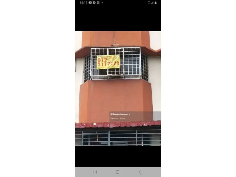 Exterior features: orange painted facade, window with security grille, red awning, signboard with contact information.