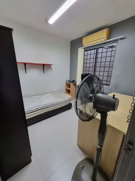 Bedroom features: single bed frame, mattress, wooden bedside table, black wardrobe, red wall shelf, window with grid pattern, wall-mounted air conditioning unit, ceiling light, floor fan, tiled flooring, painted walls in light color, desk or table; style: minimalist.