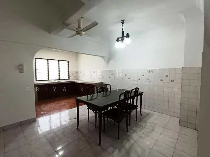 Dining features: white painted walls, white ceiling, 5-blade ceiling fan, dining table with 6 chairs, tile flooring, window with horizontal slats, kitchen area visible in background, light fixture with multiple bulbs. Kitchen features: brown cabinetry, tile backsplash, countertop, kitchen sink area visible.