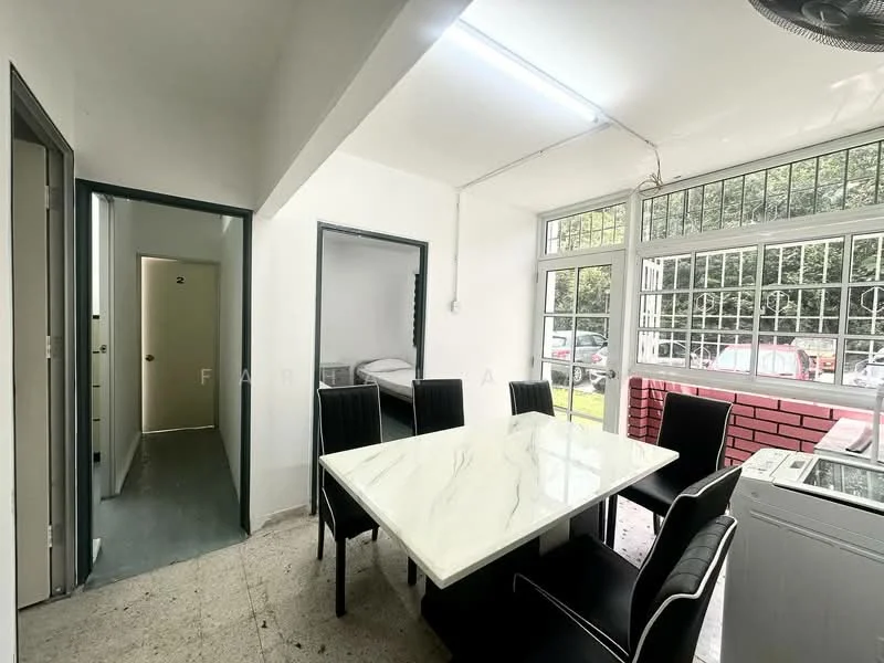 Dining features: white marble dining table, 6 black upholstered dining chairs, large windows with metal grilles, light grey walls, tile flooring, ceiling light fixture, open layout to adjacent rooms, view of outdoor area; style: modern; view: garden. Room features: grey painted walls, doorway leading to hallway, doorway leading to bedroom, visible laundry area, tile flooring.