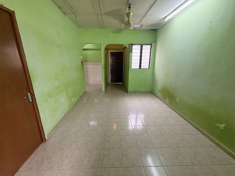 Room features: green painted walls, ceramic tile flooring, single ceiling fan, window with blinds, arched doorway, light switch, door leading to another room, corner with wall stains.